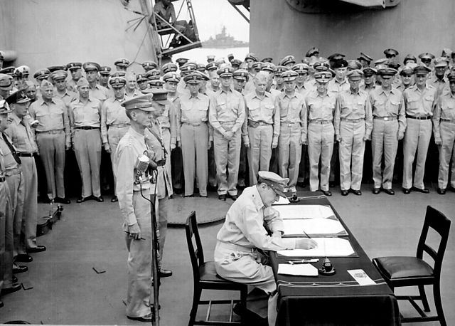 File:Douglas MacArthur signs formal surrender.jpg