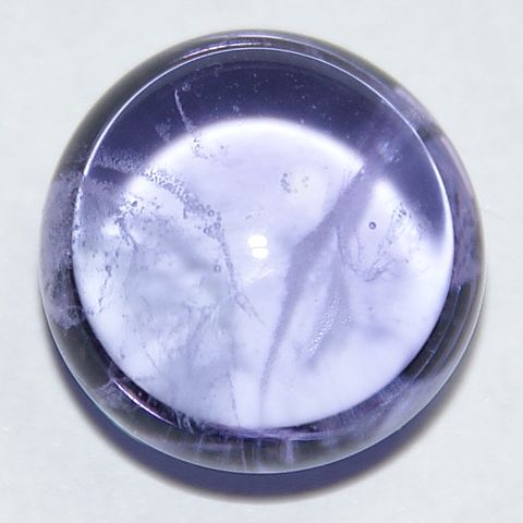 File:Neodymium-glass.jpg