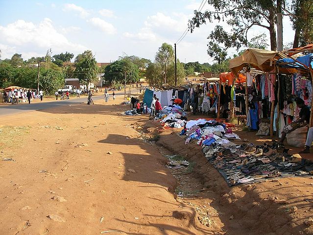 File:Chipata - roadside clothes vendors.JPG