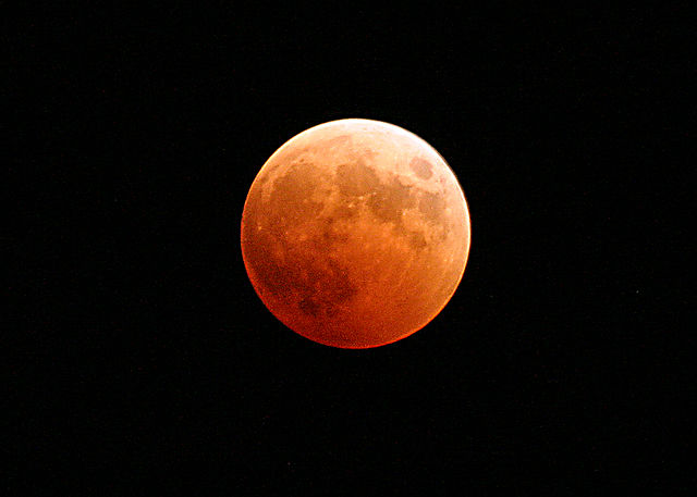 File:US Navy 041027-N-9500T-001 The moon turns red and orange during a total lunar eclipse.jpg