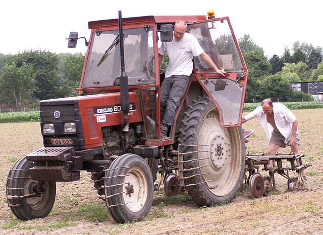 File:TractorWithMountedRototiller.JPG
