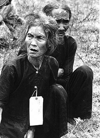 File:Vietnamese villagers suspected of being communists by the US Army - 1966.jpg