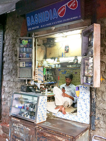 File:Cellphone repair kiosk, Colaba, Mumbai.jpg