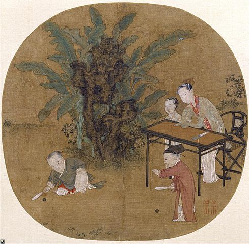 File:Hitting the Ball in the Shadow of the Banana Leaves.jpg