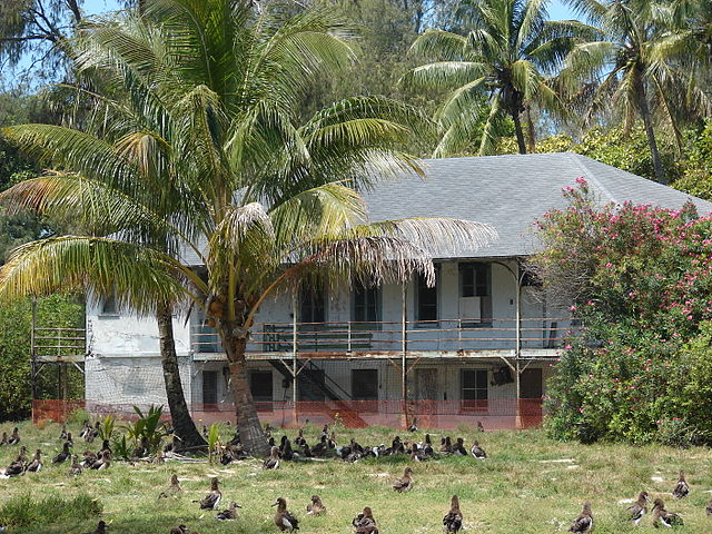 File:Starr 080531-4733 Midway Island Cable station building (nb 643) in May 2008 with cocos nucifera.jpg