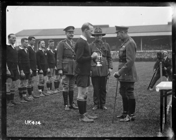File:King George V presents a cup to the captain of the winning New Zealand Services Rugby Team, London.jpeg