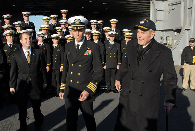 File:US Navy 090109-N-7656T-060 Capt. Kevin E. O'Flaherty, commanding officer of the aircraft carrier USS George H.W. Bush (CVN 77), escorts former President George H.W. Bush.jpg