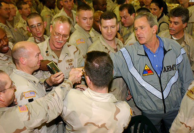 File:US Navy 031127-F-5435R-006 President George W. Bush pays a surprise visit to Baghdad International Airport (BIAP).jpg