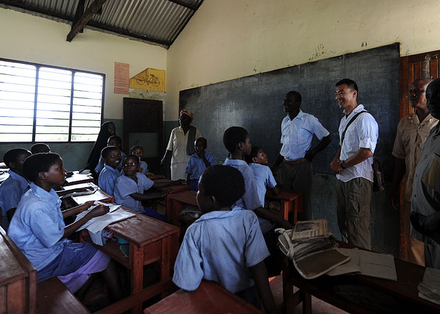 File:US Navy 101117-N-7241L-004 U.S. Navy Lt. Perry Choi, 3rd from right, team leader for Maritime Civil Affairs Team (MCAT) 205.jpg