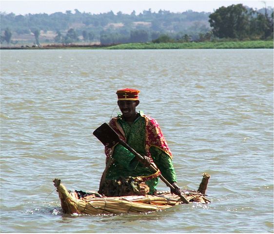 File:Orthodox priest paddling.jpg
