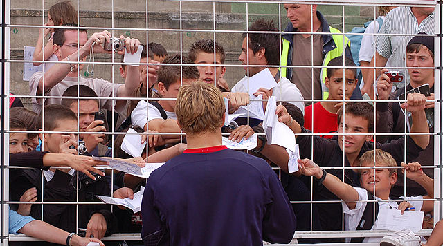 File:St Jonny signing autographs.jpg